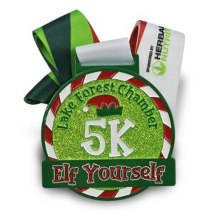 Custom 5K race medal with green enamel finish and festive ribbon